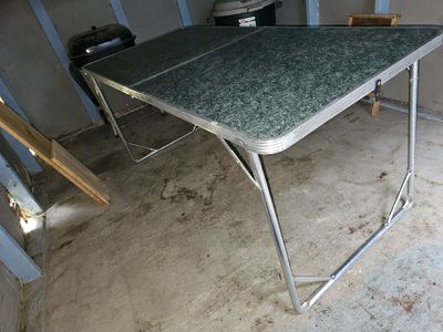 Folding camp table