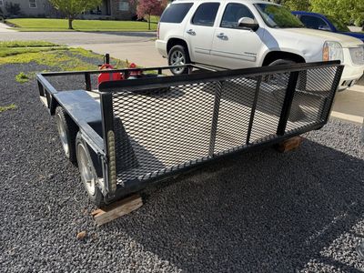 Double axle trailer. Sturdy and well built. Rear ramp.