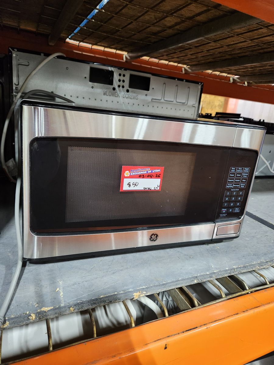 LOW PRICE GUARANTEED! GE STAINLESS STEEL COUNTER TOP MICROWAVE