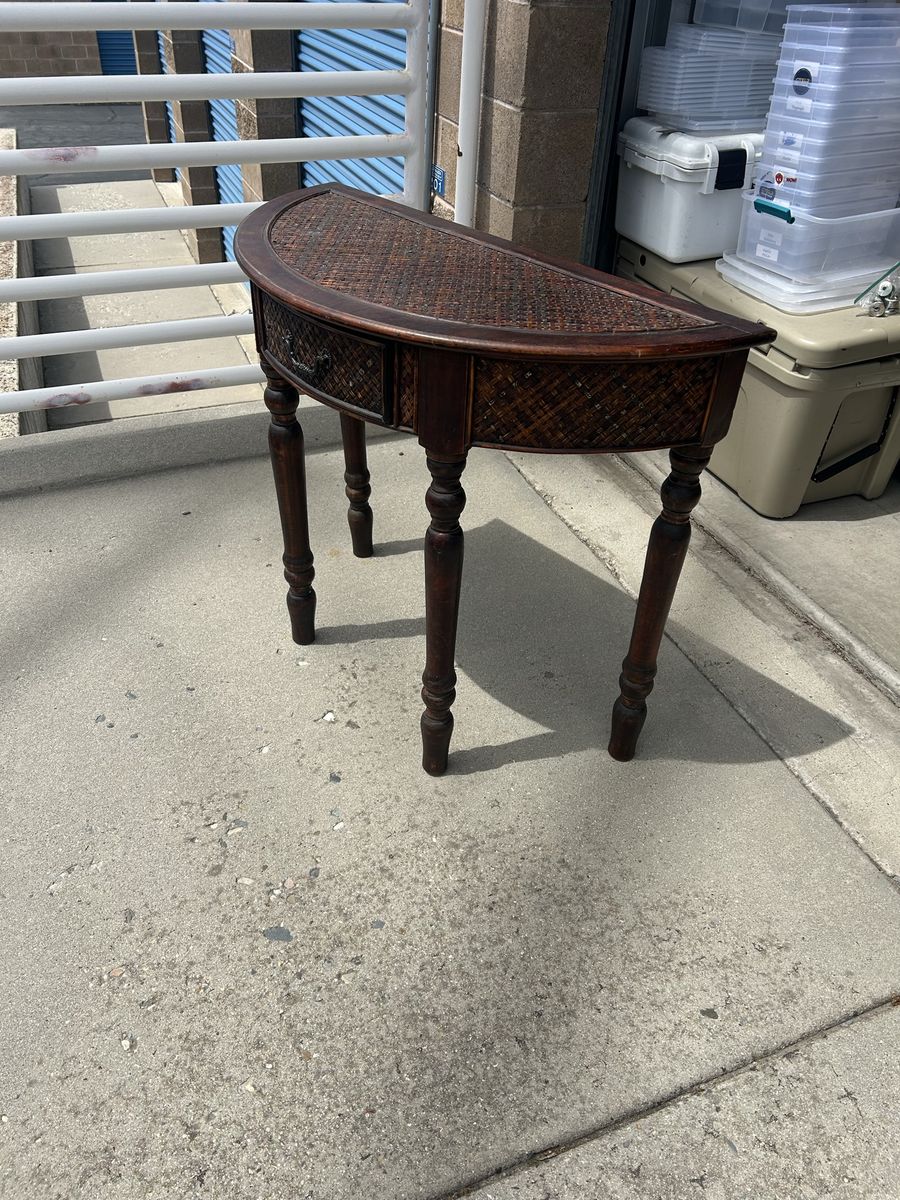Antique Dark Wood Demi-Lune Console Table with Woven Rattan Top