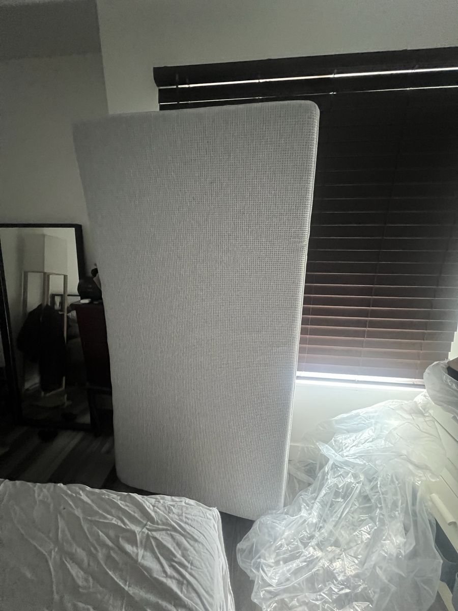 Memory foam Twin sized mattress, excellent condition, used for a week, stored in plastic in smoke free home.