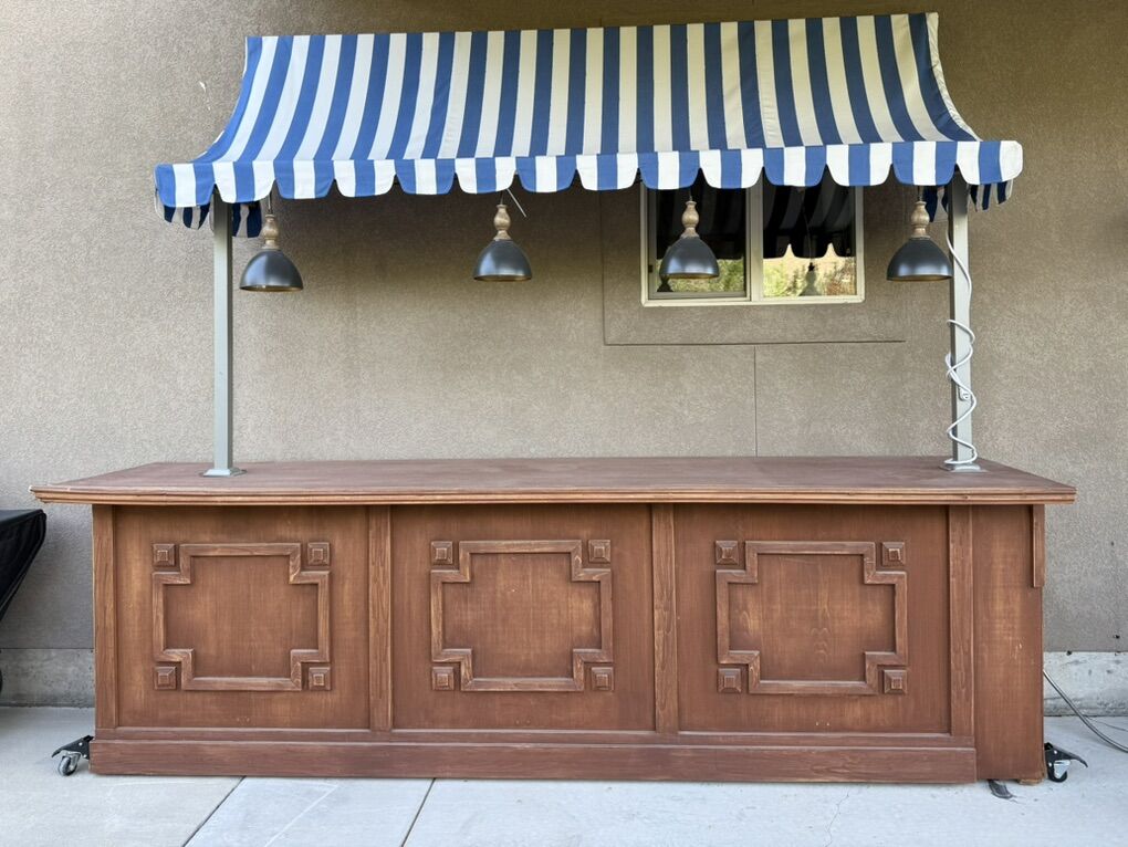 For Sale Wooden Bar With A Lighted Awning