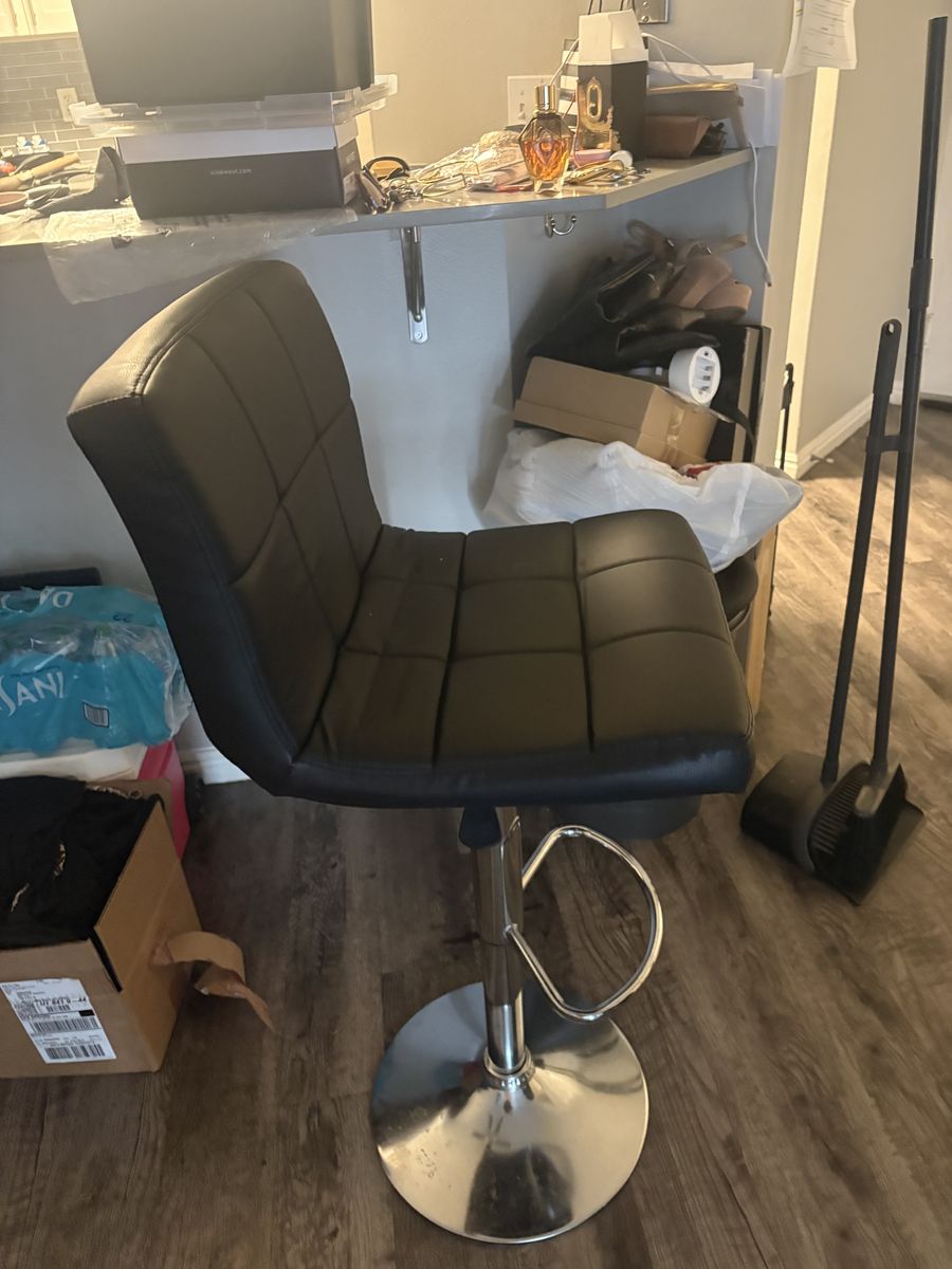 Black Faux Leather Swivel Bar Stool with Chrome Base & Footrest
