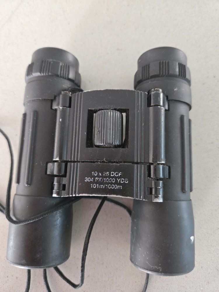 Binoculars 10 by 25, 1000 yard
