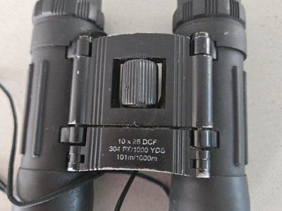 Binoculars 10 by 25, 1000 yard