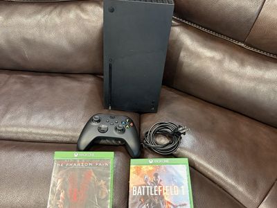Microsoft Xbox Series X Console with Controller, Power Cable, and Two Games