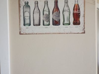 Vintage Coca-Cola Bottle Evolution Metal Wall Sign Decor