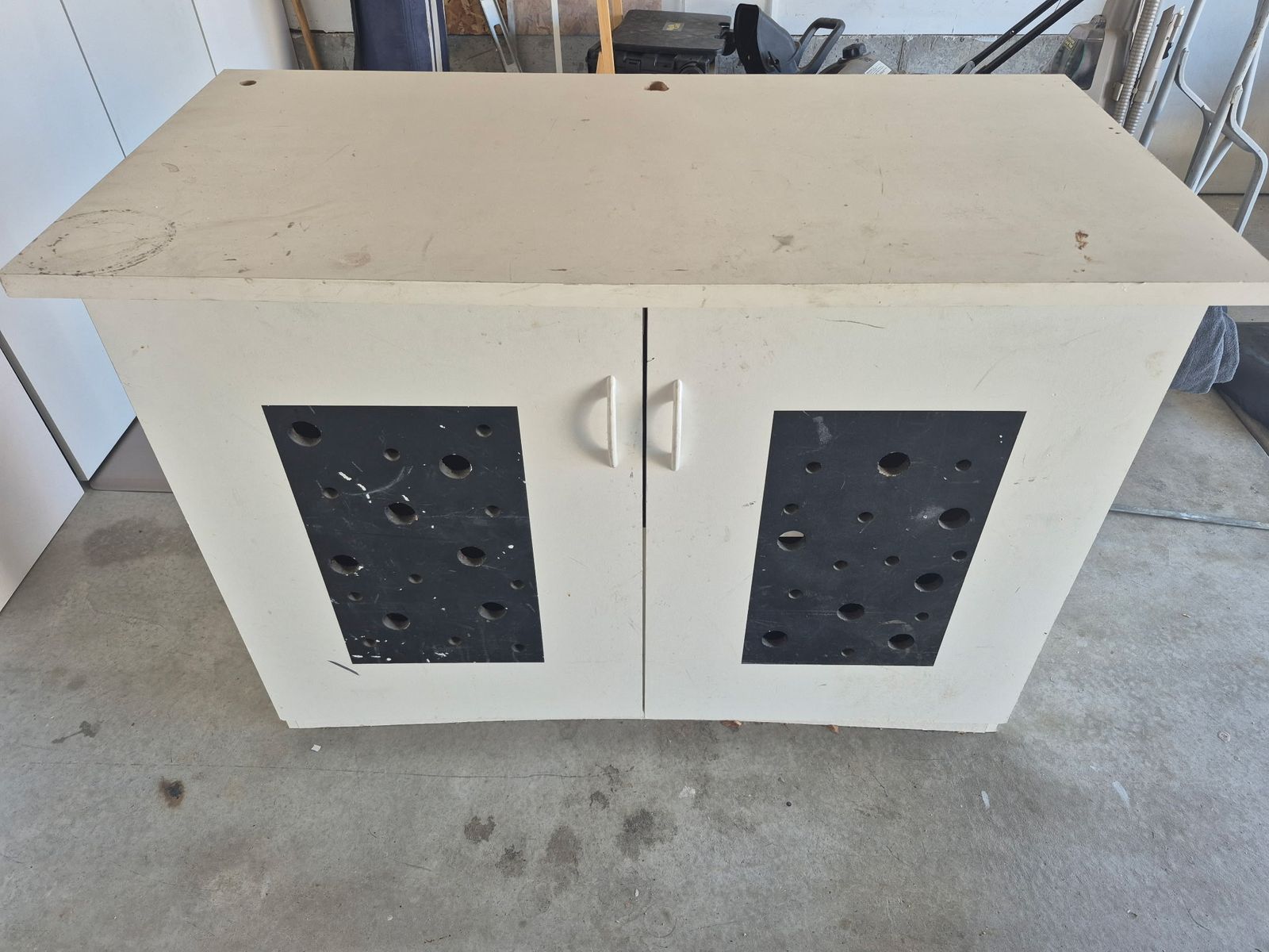 Black And White Cabinet With Cut Out Doors