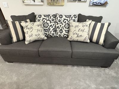 Ashley Signature Design Levon sofa in charcoal.