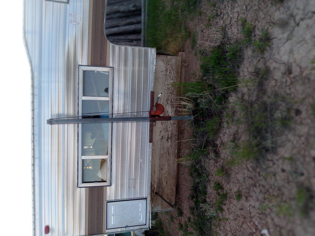 Eight foot cabover camper.