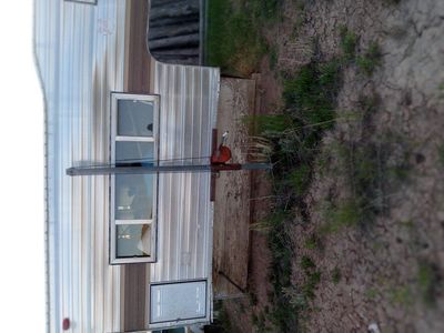 Eight foot cabover camper.