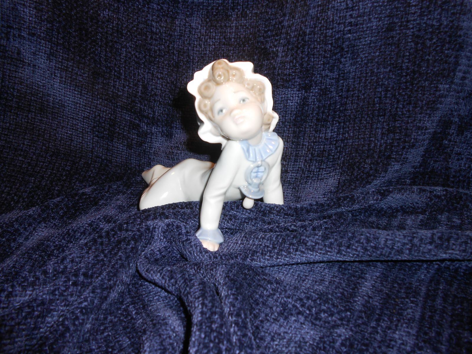 Lladro Baby w/pacifier on floor crawling (Retired)