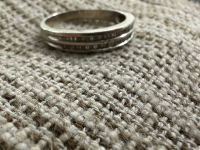 Platinum ring with diamond inlay