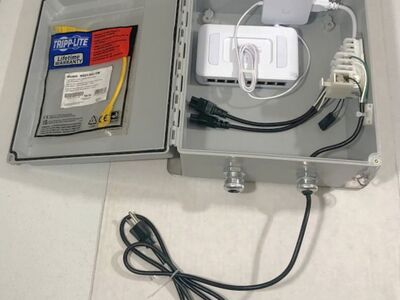 USW-LITE-8-POE UniFi Ethernet Switch 8-Ports w/ adaptor contained in a Hoffman A12106CHQRFG NEMA 4x Enclosure Solid Cover