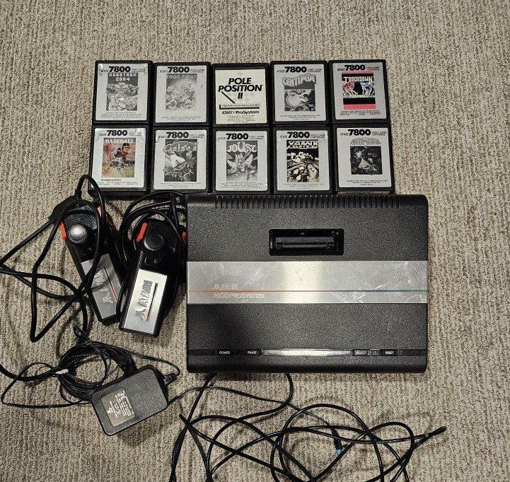 Atari 7800 console with 10 games and two controllers lot. everything's tested and works great.