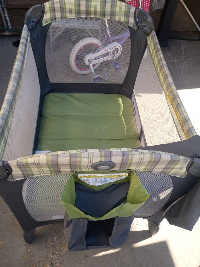 graco pack and play green grey