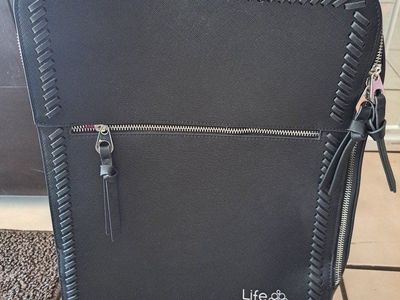 New black suitcase backpack