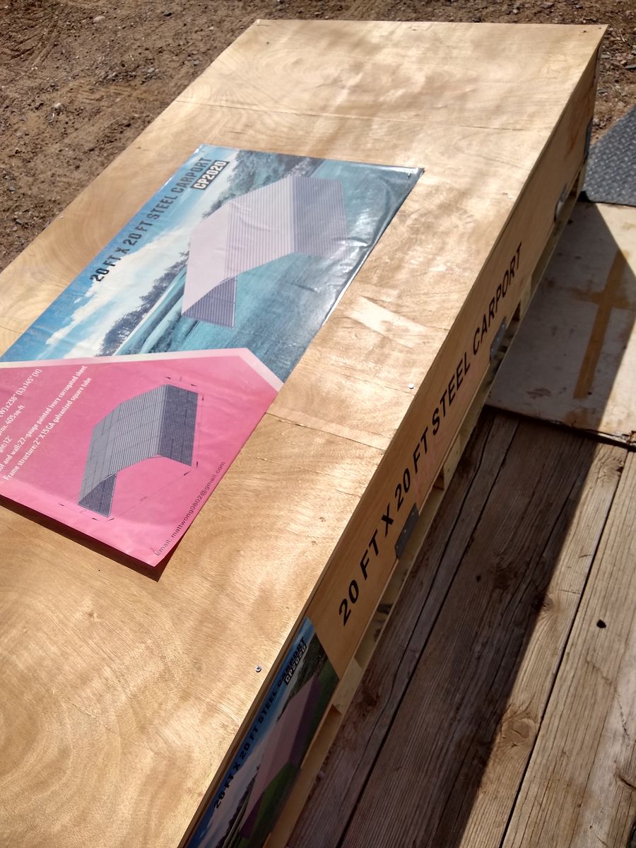 20x20 Steel carport with three enclosed sides