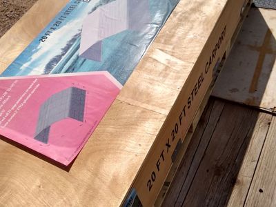 20x20 Steel carport with three enclosed sides