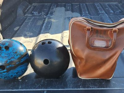 2 old spare bowling ball can be used for a craft or something
