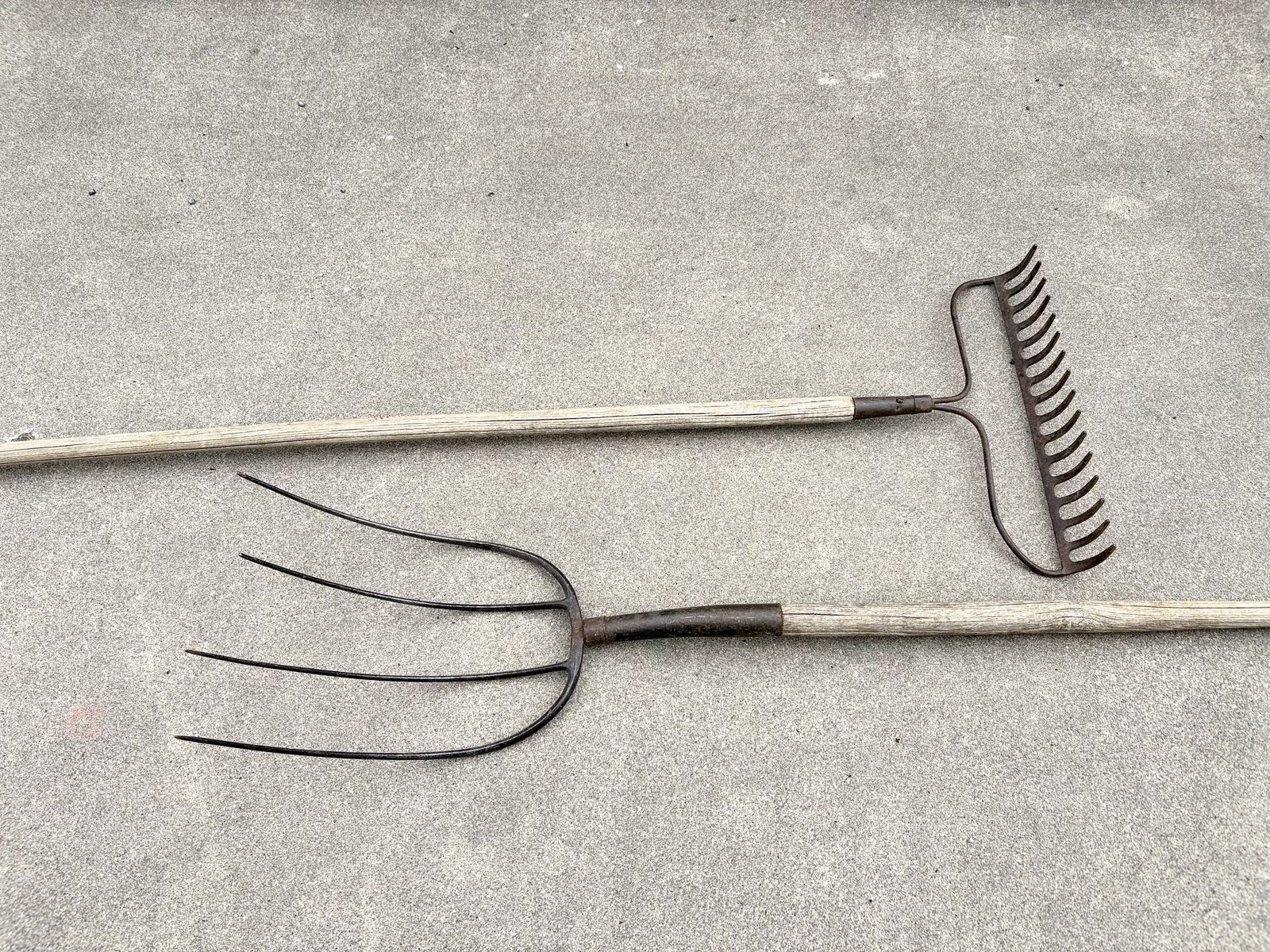 Antique pitchfork, rake. Great Halloween decorations. 4 time hay pitchfork. Wooden steel farming