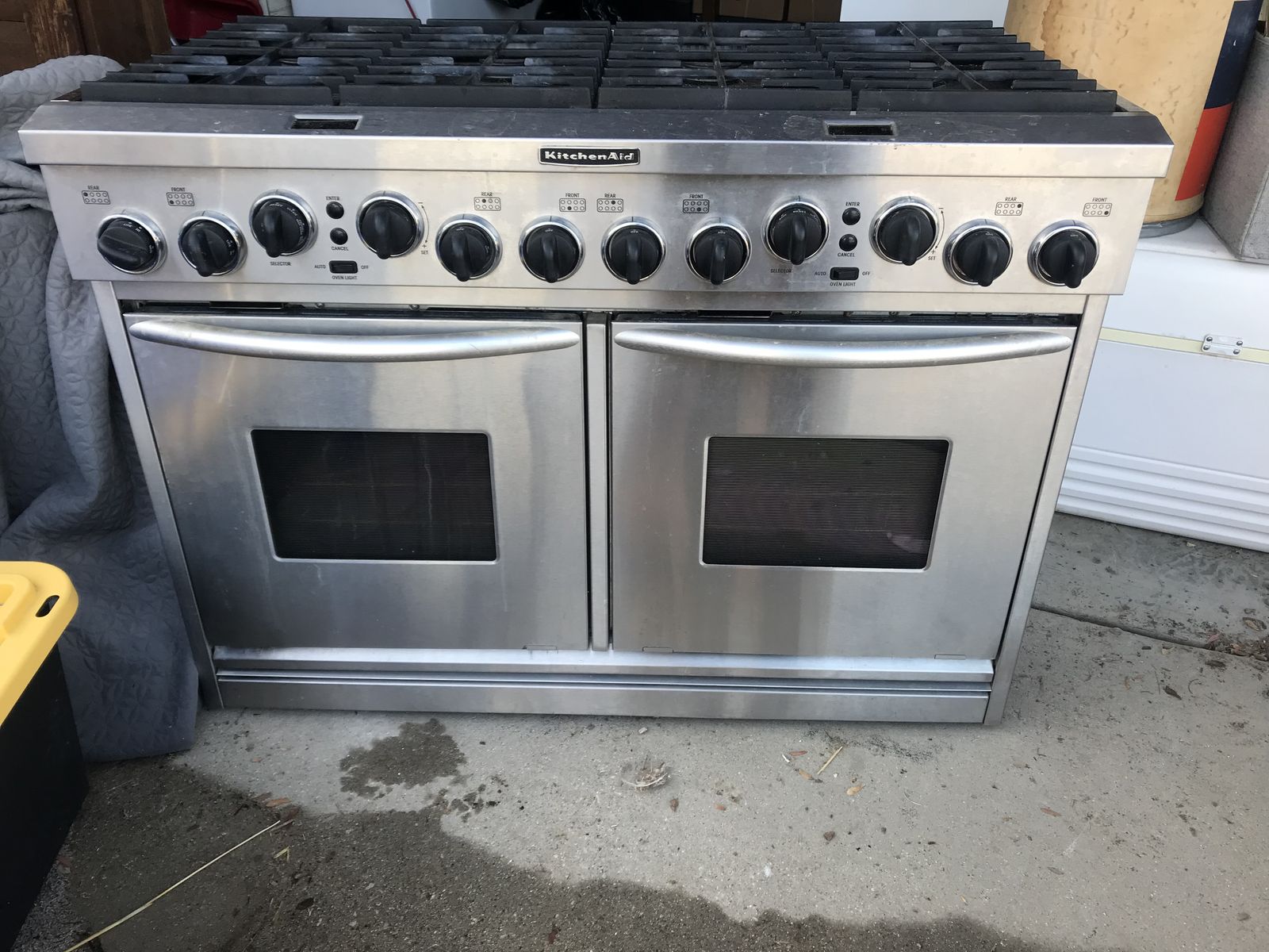$6000 Kitchen Aid 8 Burner gas stove, electric ovens: $600