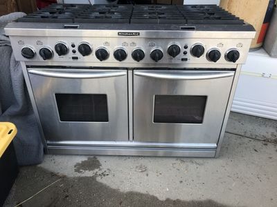 $6000 Kitchen Aid 8 Burner gas stove, electric ovens: $600