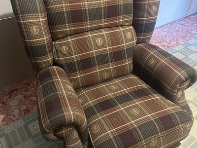 Plaid Armchair and Brown Leather Recliner