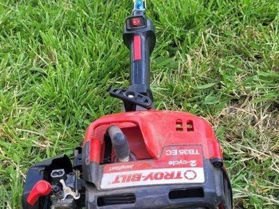 Troy bilt trimmer 2cycle engine good working conditions.