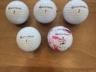 5 TaylorMade golf balls (used)