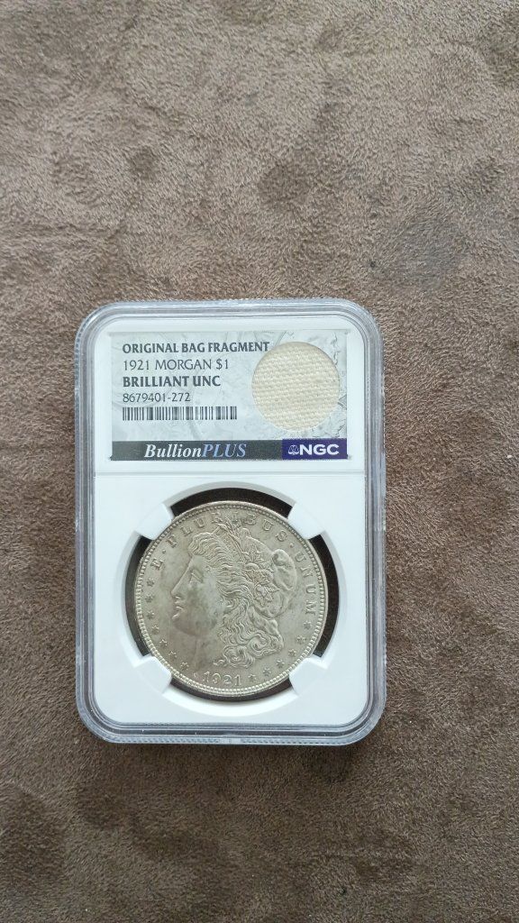 1921 Morgan $1 Silver Dollar Brilliant Uncirculated (BU) with Original Bag Fragment - NGC Certified