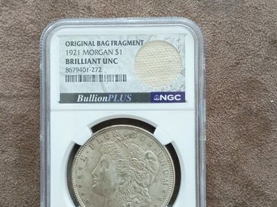 1921 Morgan $1 Silver Dollar Brilliant Uncirculated (BU) with Original Bag Fragment - NGC Certified