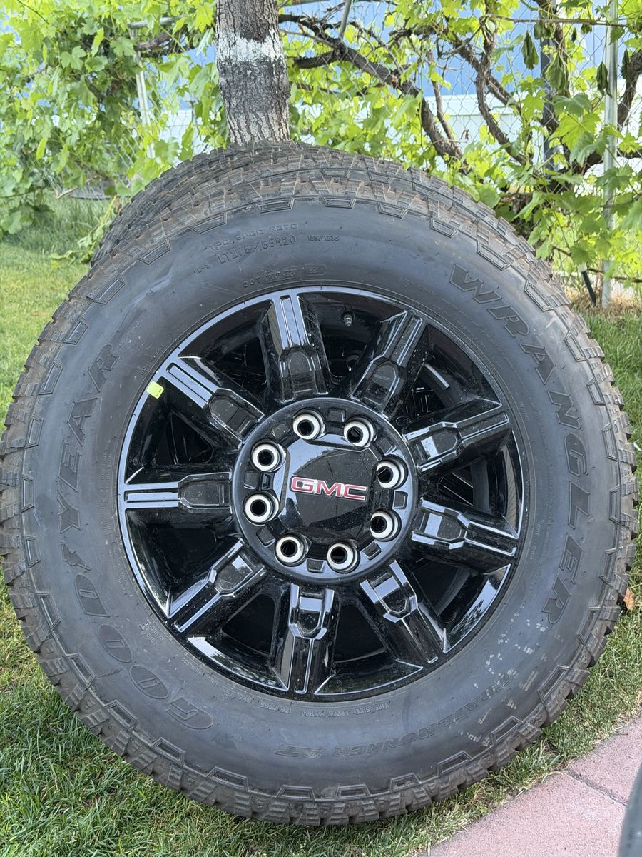 Brand new 2026 GMC sierra 3500 wheels on tires