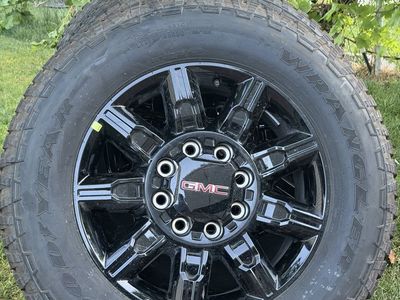 Brand new 2026 GMC sierra 3500 wheels on tires