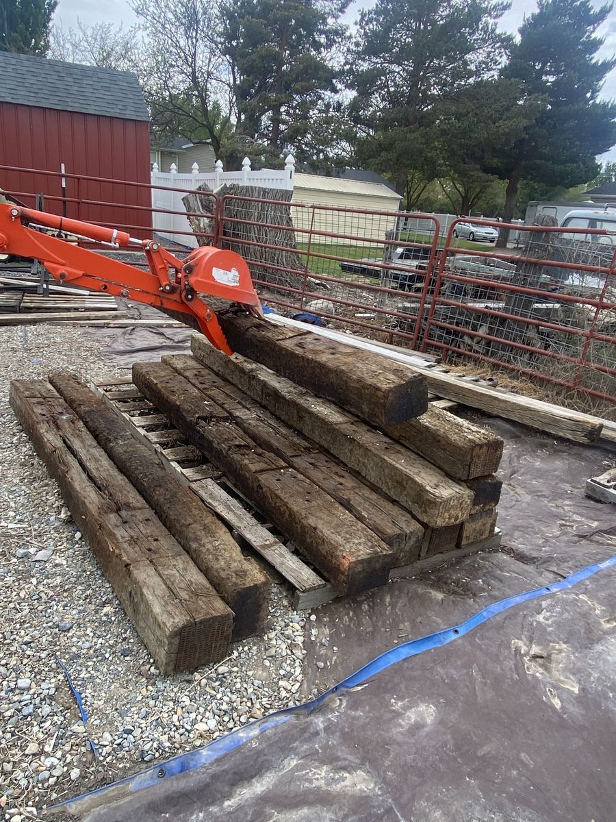 Railroad Ties for sale. I have TRACTOR with Backhoe to assist loading! Only $ 20.00 each.