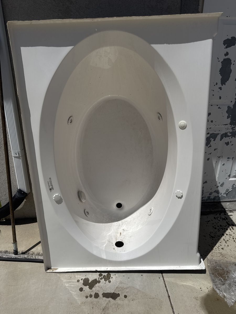 White Whirlpool Jetted Bathtub with Pump and Jets - Used, Good Condition