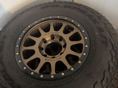 Set of 4 Falken Wildpeak A/T LT285/75R18 Tires with Method Race Wheels