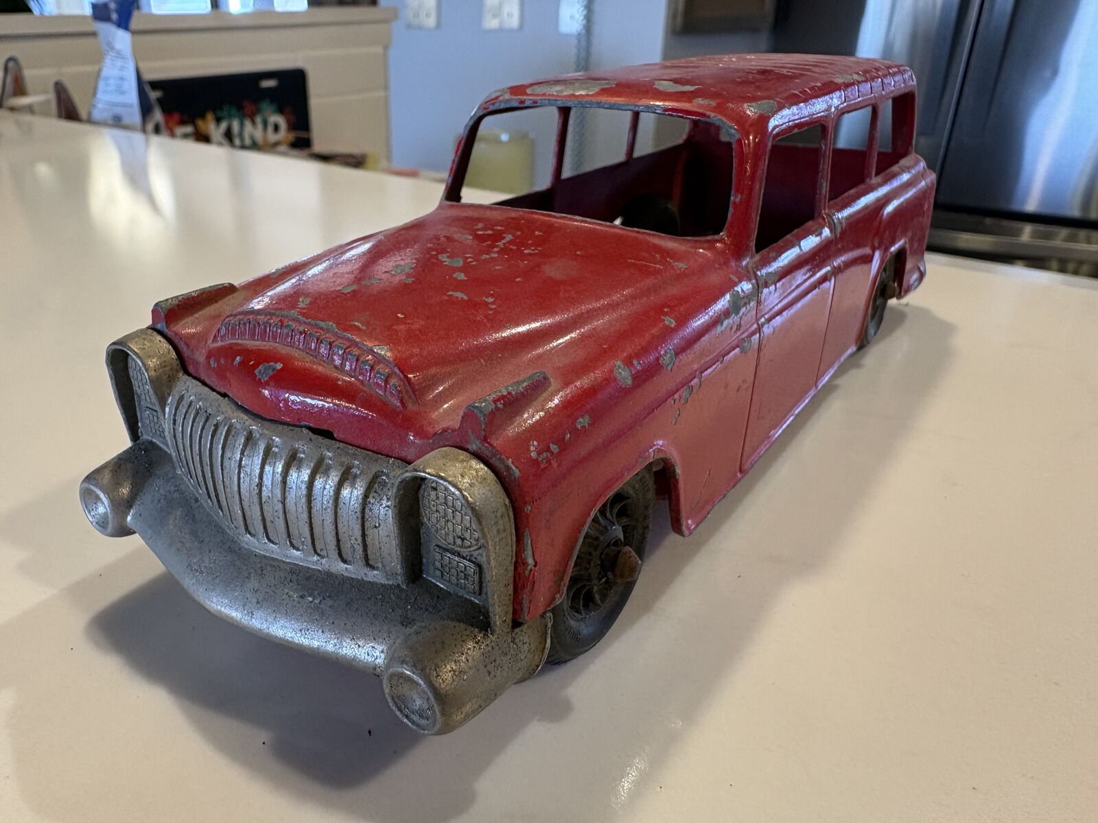 Antique Hubley metal station wagon toy car. Great patina