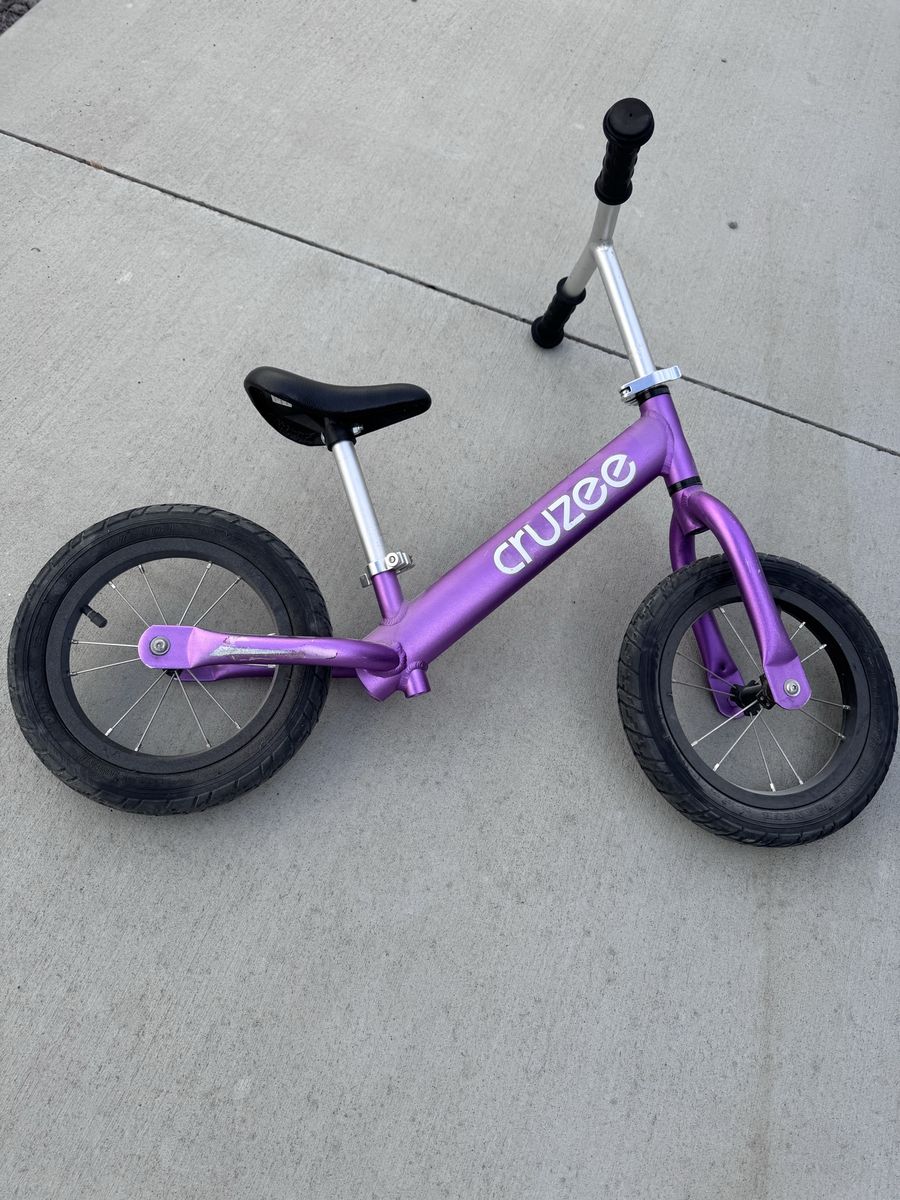 Purple Cruzee balance bike