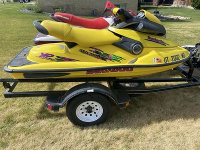 Two 1997 skidoo and trailer