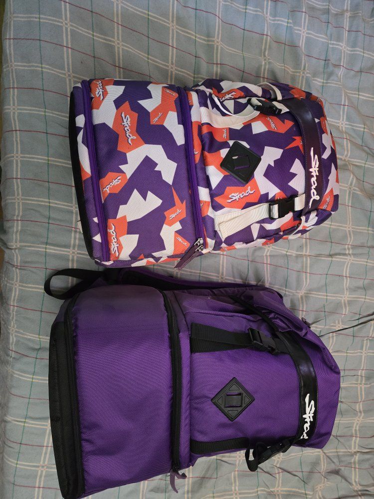 Stradman camouflage and purple backpacks