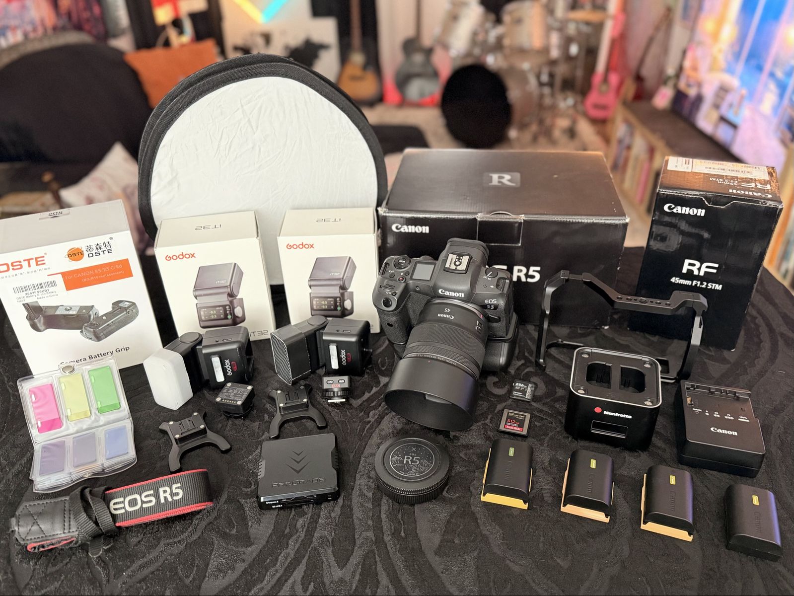 Canon R5 Kit w/ 45mm f1.2 lens, 4 batteries, grip, cage, CF Express and SD Card, 2 Godox iT32 Flashes, and more!!!
