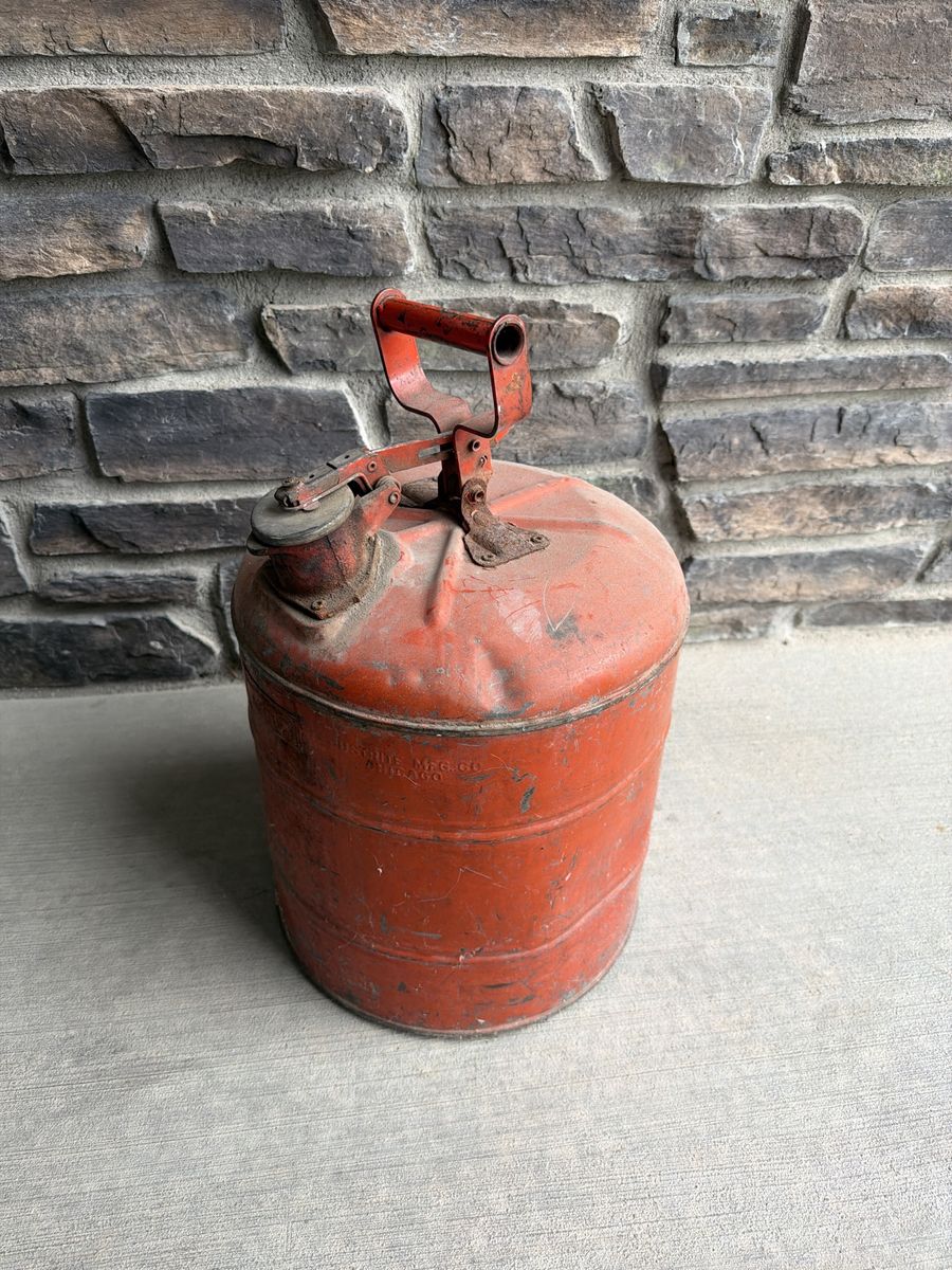 Vintage Red Metal Gas Can Fuel Container with Handle.