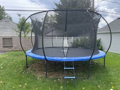 14’ trampoline with safety net for free!