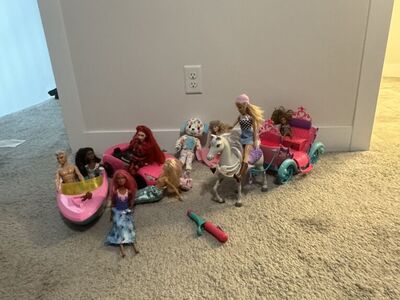 Barbie Dolls, Vehicles, and Carriage