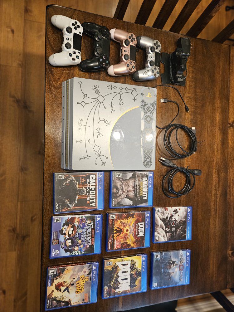 Sony PlayStation 4 Pro 1TB God of War Limited Edition Console Bundle with 4 Controllers and Games
