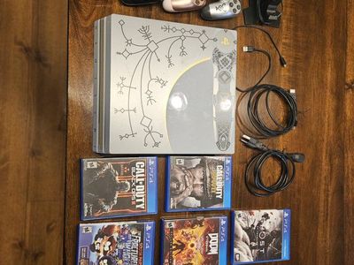 Sony PlayStation 4 Pro 1TB God of War Limited Edition Console Bundle with 4 Controllers and Games