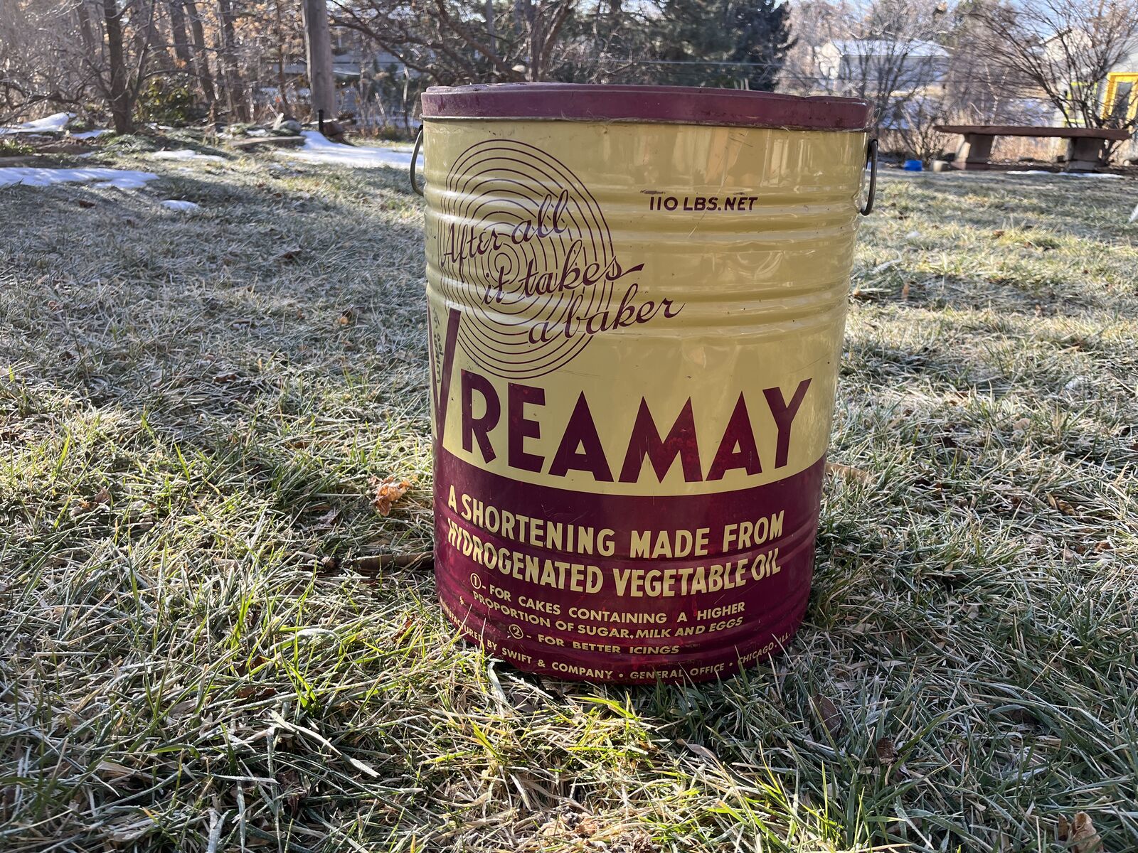 Antique metal food storage drum