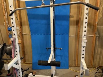 Squat rack, pulldown machine.