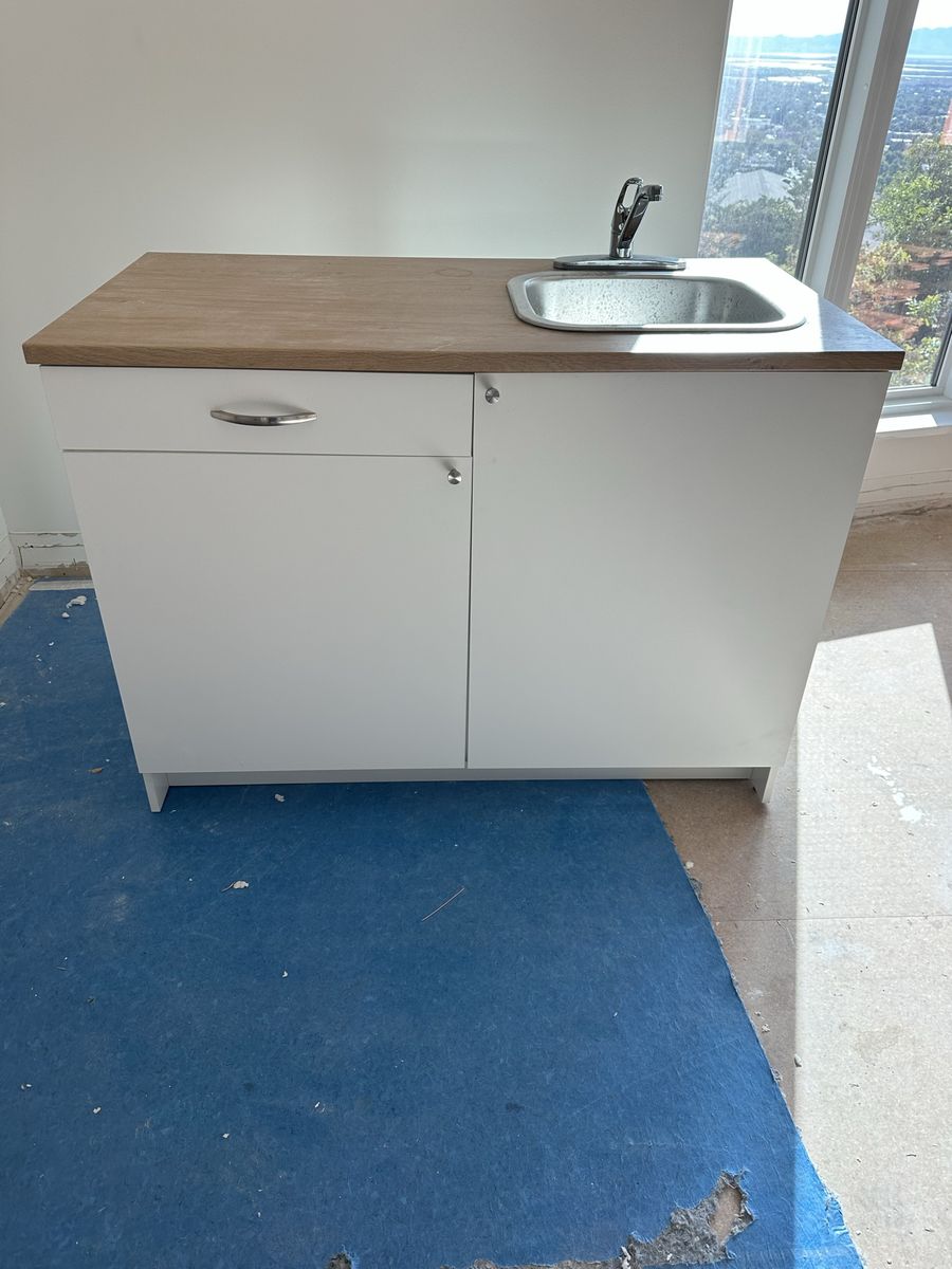 Utilized Sink/Cabinet